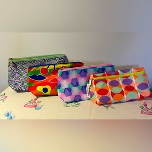 Four Clinique cosmetics bags. NWOT